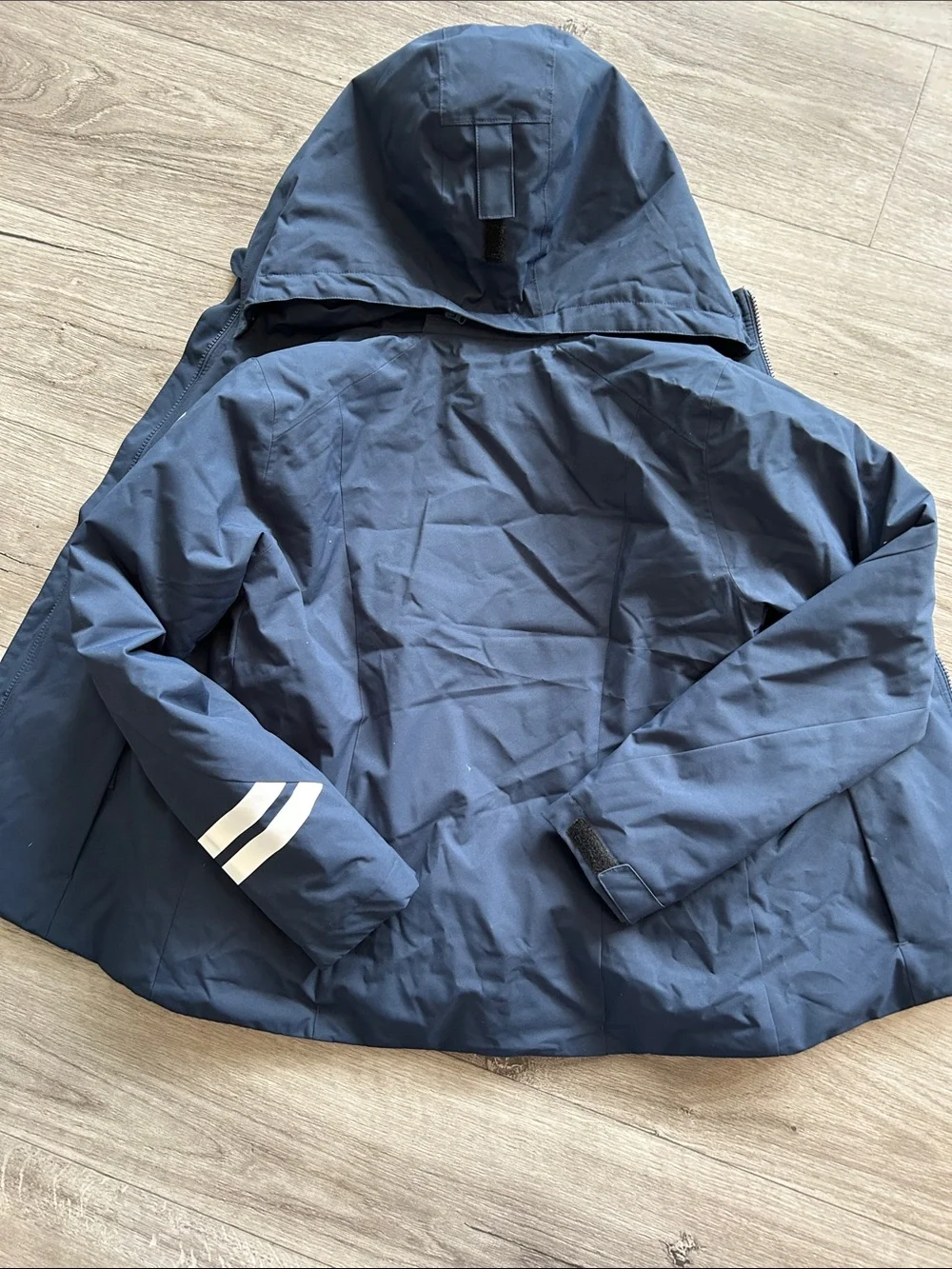 Rossignol Navy Hooded Kids Ski Jacket with White Sleeve Stripes